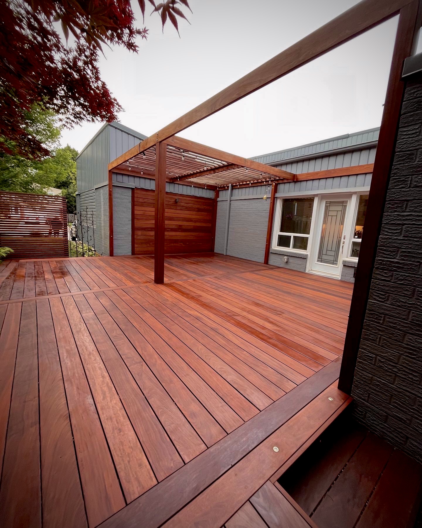Residential backyard deck sanding and staining project in the GTA